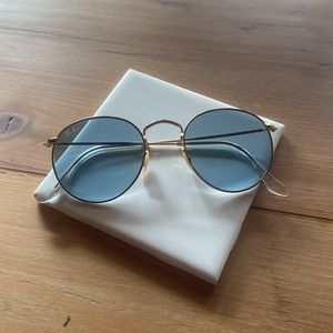 RB3447/N Ray-Ban Sunglasses, blue lenses and round metal frames
